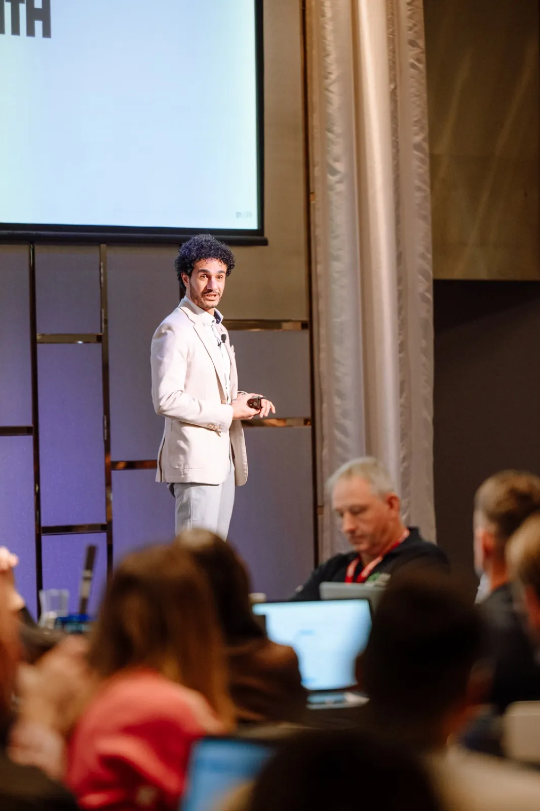 Abdo presenting to a working audience at the AI Bootcamp